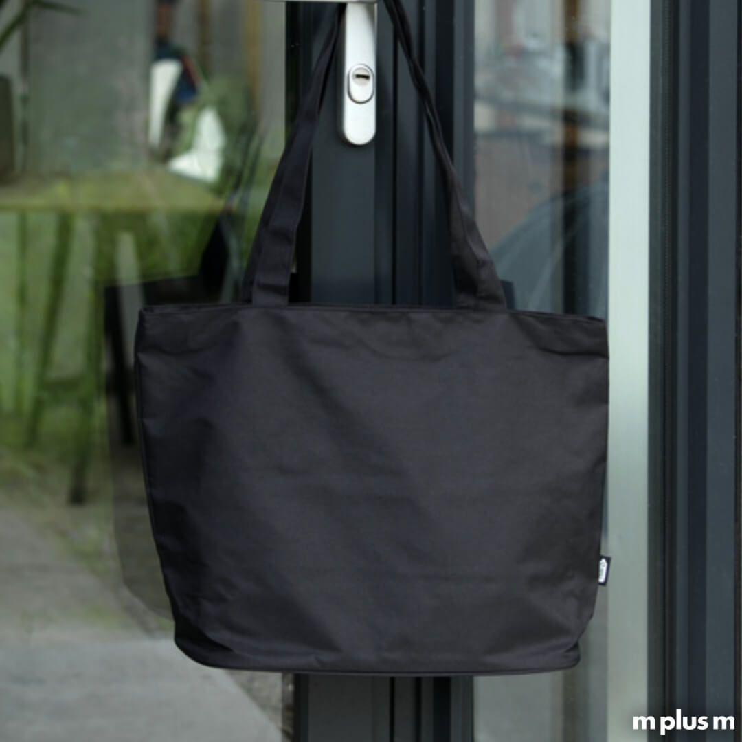 Schwarze Strandtasche 'Caren' als nachhaltiges Giveaway mit Logo bedrucken