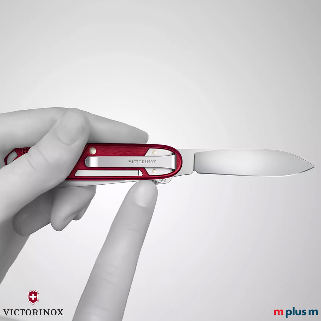 Detailaufnahme Synergy X Alox Messer beim Öffnen mit Alox-Schalen und personalisierbarer Gravurfläche