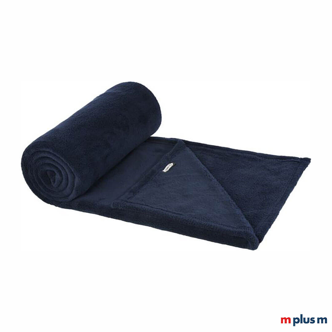 Die warme und weiche Decke 'Flauschi' ist ideal als Tagesdecke oder als Couchdecke. Mit Logo Druck ein tolles Werbegeschenk für Kunden und Mitarbeiter