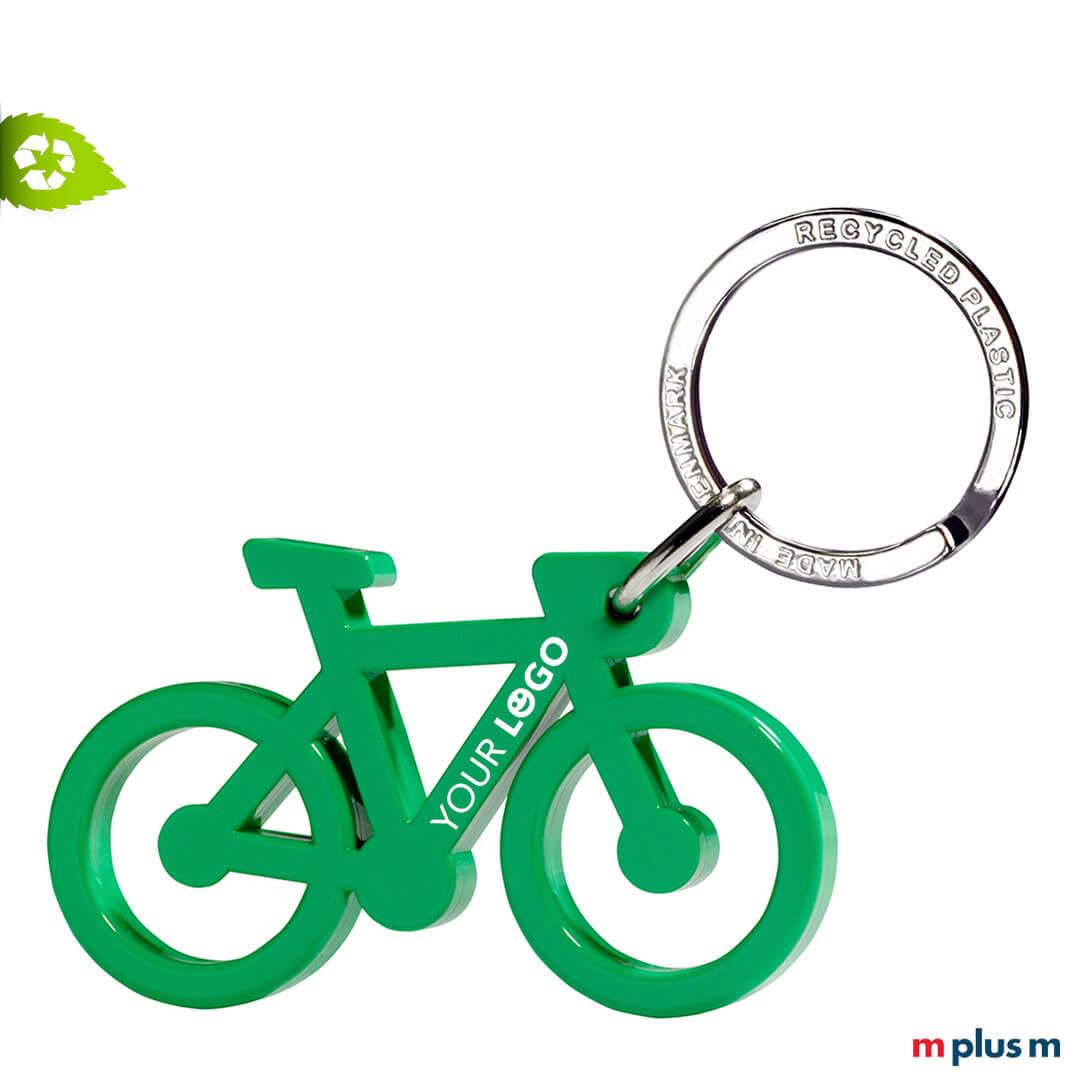 Nachhaltiger Werbeartikel aus Europa: Grüner Fahrrad Schlüsselanhänger aus Recycling Material und mit Logo zu bedrucken.